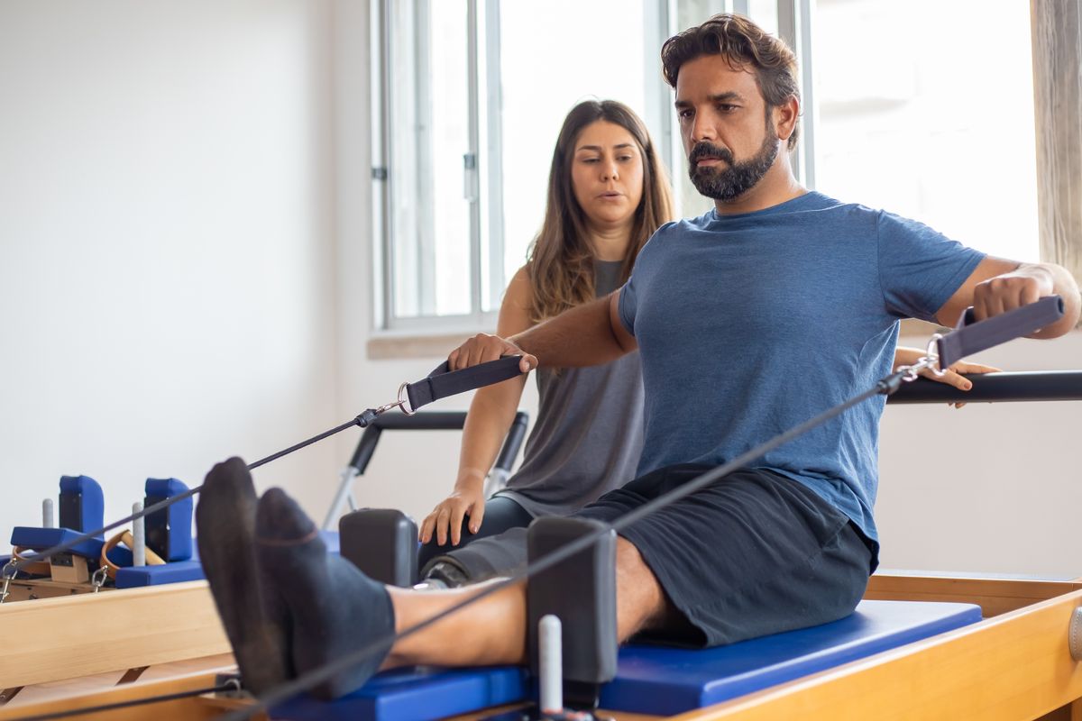 A person completing a guided rehabilitation exercise