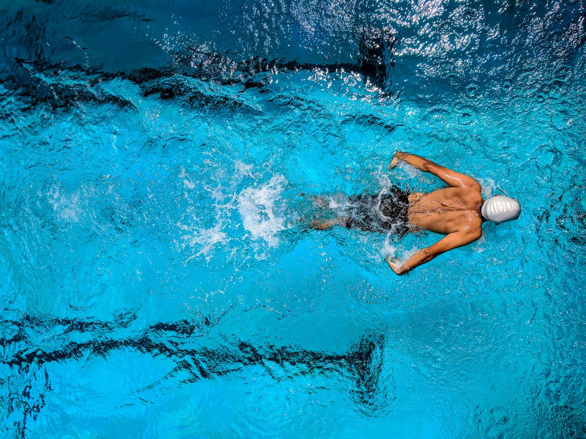 A swimmer training in a pool